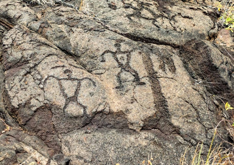 Human figure Petroglyphs at Pu'uloa along Chain of Craters Road Volcanoes National Park Big Island