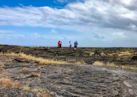 petroglyphs trail and visitors along chain of craters road volcanoes national park big island hawaii  